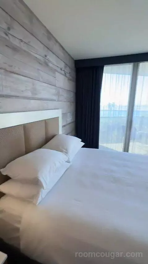 Queen Room with Two Queen Beds and Ocean View (#704) bed picture #8