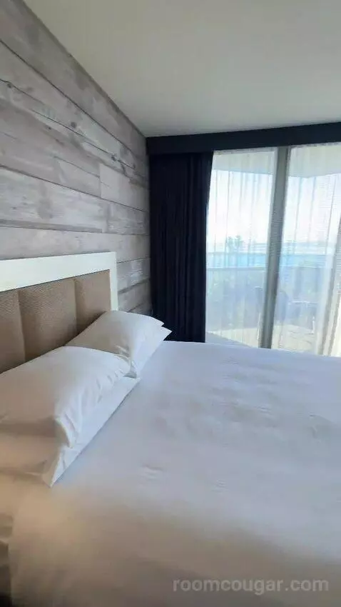 Queen Room with Two Queen Beds and Ocean View (#704) bed picture #9