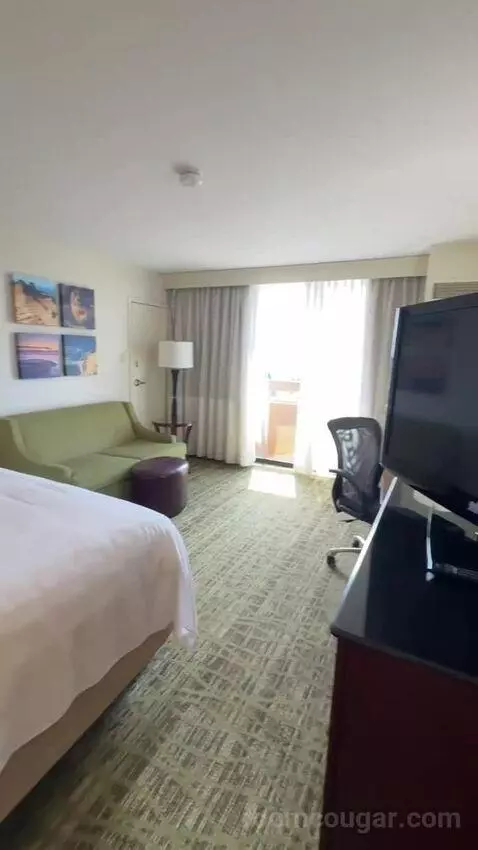 Corner King Room with Balcony (#619) bed picture #2