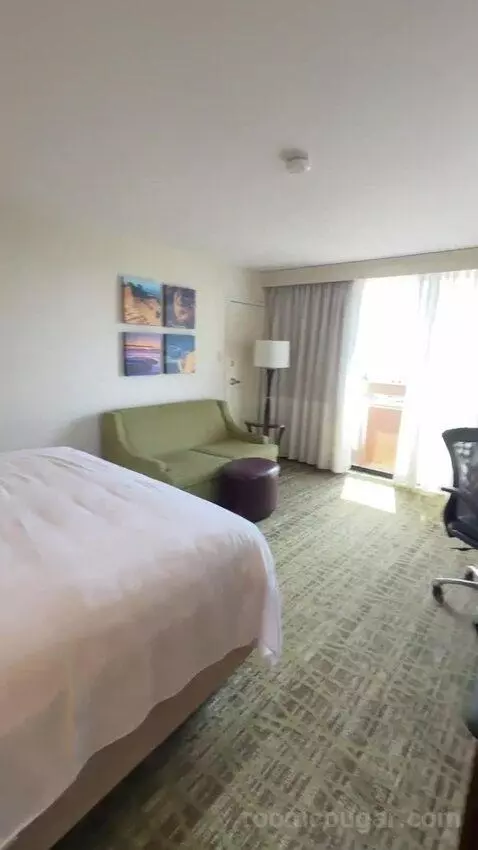 Corner King Room with Balcony (#619) bed picture #4