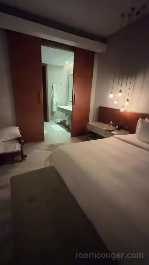 Superior King Suite with Downtown View Including Signature St. Regis Butler Service (#2019) bed picture #5