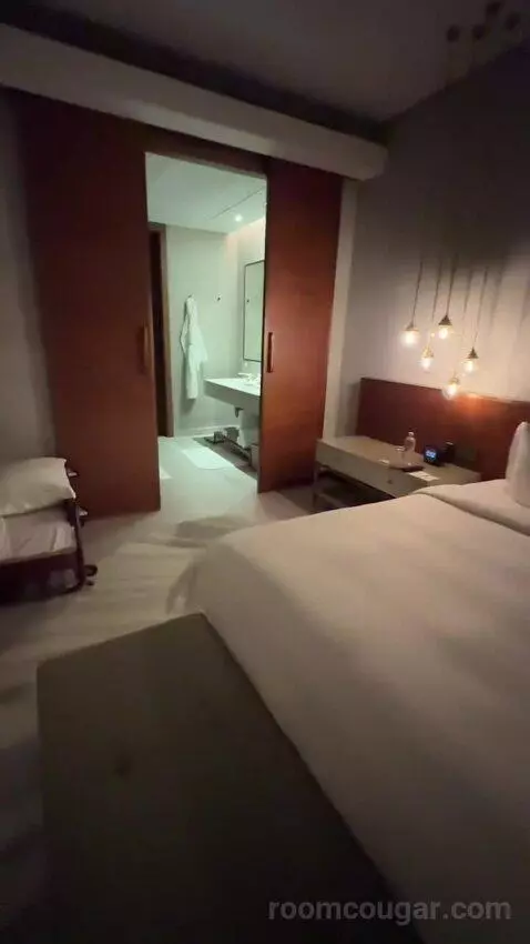Superior King Suite with Downtown View Including Signature St. Regis Butler Service (#2019) bed picture #6