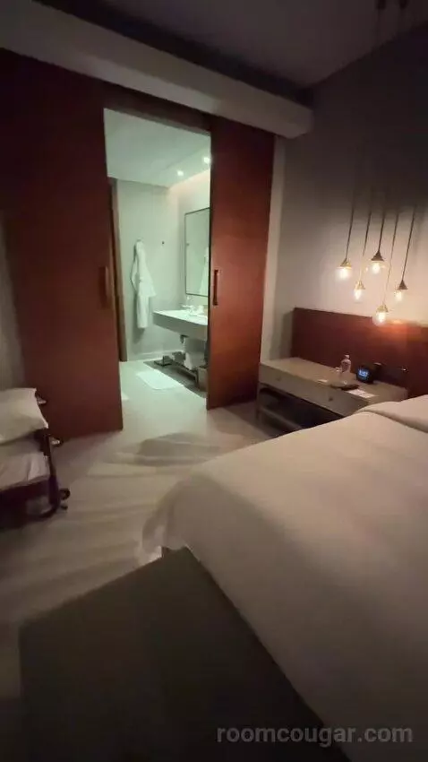 Superior King Suite with Downtown View Including Signature St. Regis Butler Service (#2019) bed picture #8