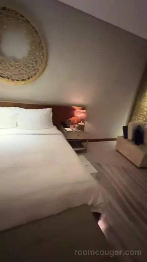 Superior King Suite with Downtown View Including Signature St. Regis Butler Service (#2019) bed picture #9