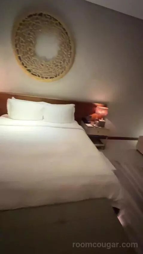 Superior King Suite with Downtown View Including Signature St. Regis Butler Service (#2019) bed picture #11