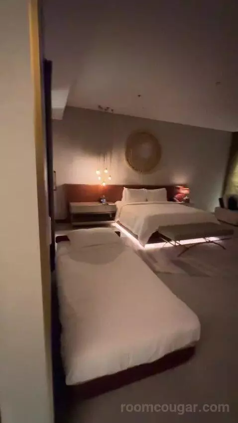 Superior King Suite with Downtown View Including Signature St. Regis Butler Service (#2019) bed picture #4