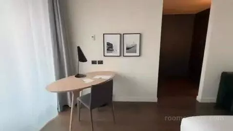 Deluxe King Room with City View bed picture #7