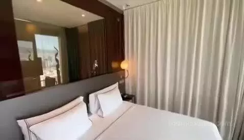 The Level Suite City View bed picture #1
