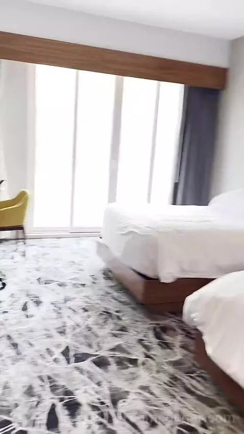 Deluxe Double Room bed picture #1