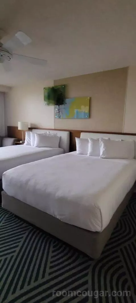 Double Room with Two Double Beds and Lake View bed picture #3