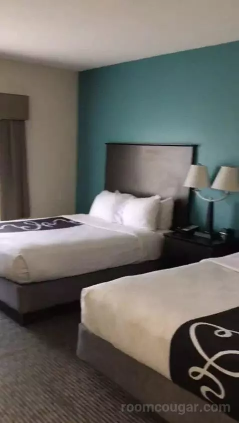 Standard Queen Room with Two Queen Beds (#417) bed picture #1
