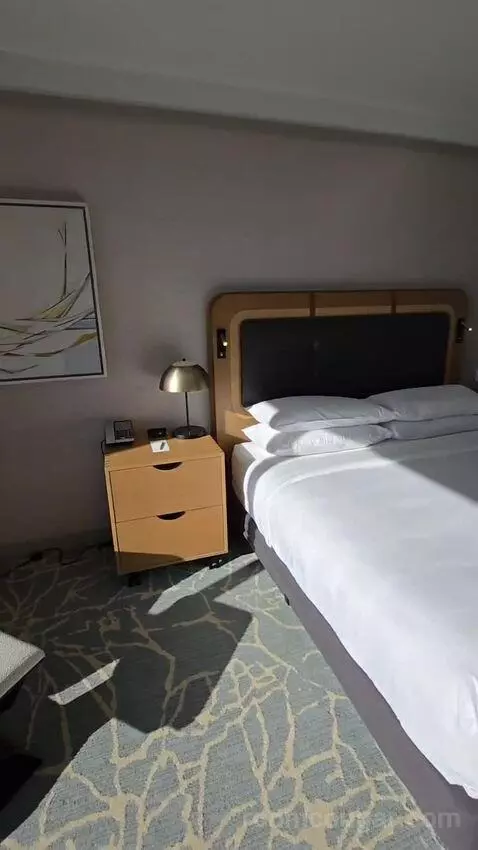 Premium Guest Room with 1 King, Water View (#1876) bed picture #5