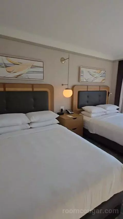 Premium Guest Room with 2 Queen, Water View (#1878) bed picture #9