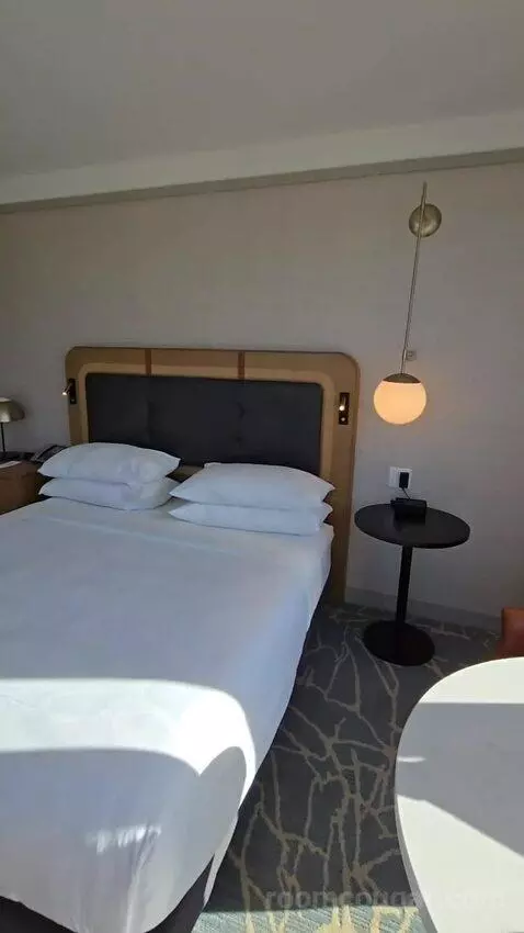 Guest Room with 1 King, City View, Corner Room (#1860) bed picture #9