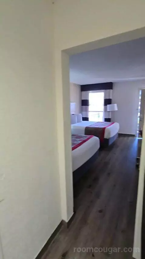 Queen Room with Two Queen Beds and Water View (#213) bed picture #1