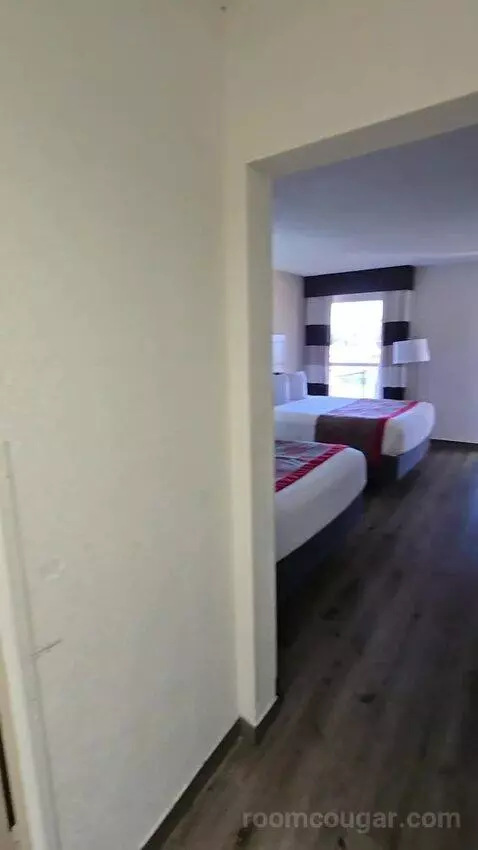 Queen Room with Two Queen Beds and Water View (#213) bed picture #2