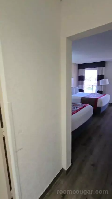 Queen Room with Two Queen Beds and Water View (#213) bed picture #3