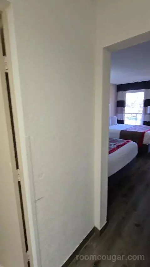 Queen Room with Two Queen Beds and Water View (#213) bed picture #4