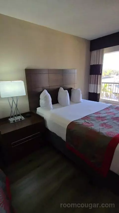 Queen Room with Two Queen Beds and Water View (#213) bed picture #9