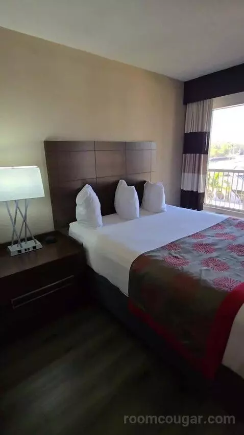Queen Room with Two Queen Beds and Water View (#213) bed picture #10