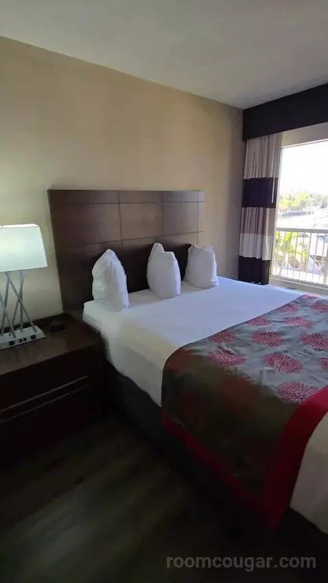 Queen Room with Two Queen Beds and Water View (#213) bed picture #11