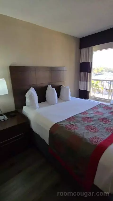 Queen Room with Two Queen Beds and Water View (#213) bed picture #12