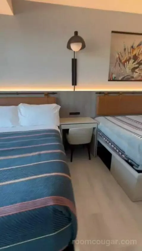 Queen Room with Two Queen Beds (#301) bed picture #8