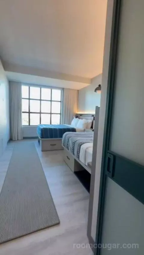 Queen Room with Two Queen Beds (#301) bed picture #11
