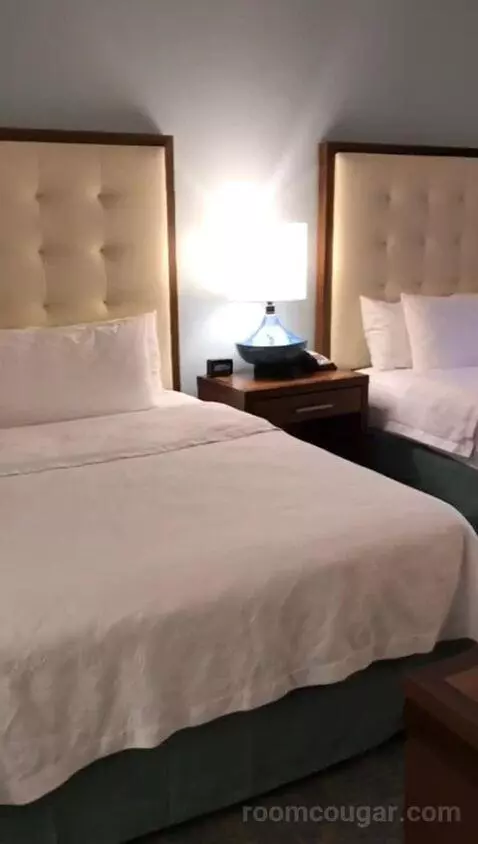 One-Bedroom Queen Suite with Two Queen Beds (#107) bed picture #3