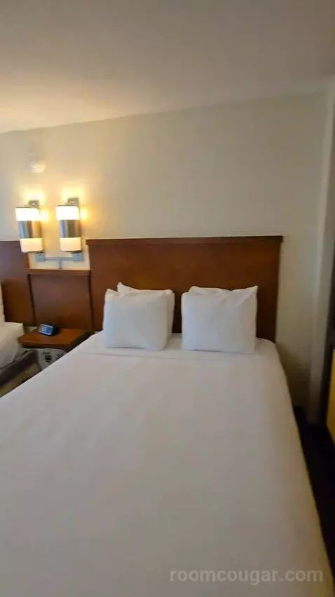 Queen Room with Two Queen Beds and Sofa Bed (#128) bed picture #5
