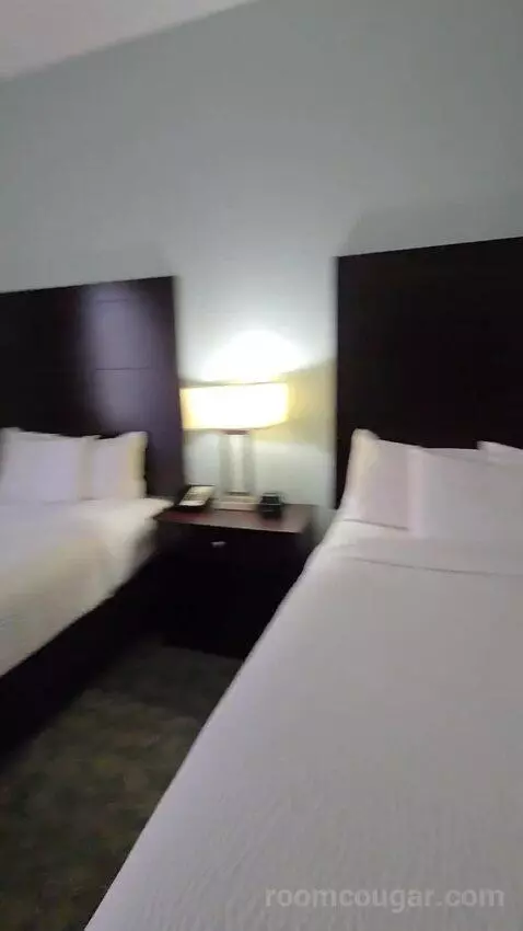 Queen Room with Two Queen Beds (#105) bed picture #11