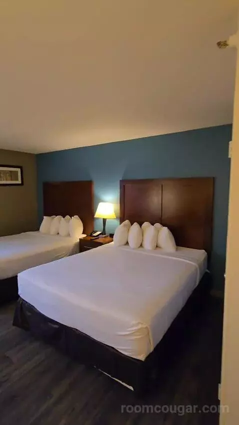 Deluxe Queen Room with Two Queen Beds with Sofa Bed (#108) bed picture #1