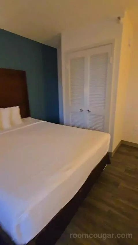 Deluxe Queen Room with Two Queen Beds with Sofa Bed (#108) bed picture #8