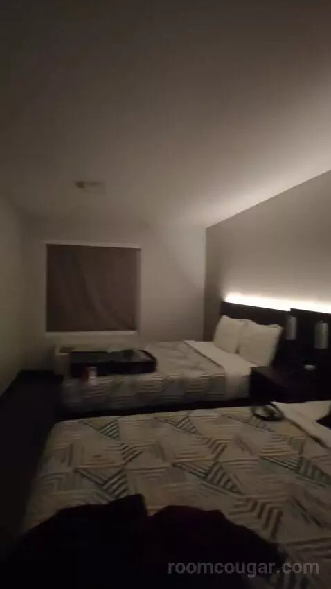 Deluxe Queen Room with Two Queen Beds (#304) bed picture #7