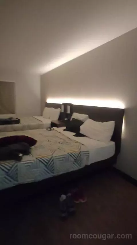Deluxe Queen Room with Two Queen Beds (#304) bed picture #3