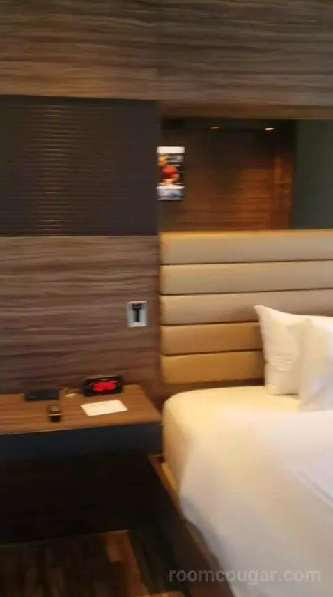 Deluxe King or Double Queen Room (#5109) bed picture #12
