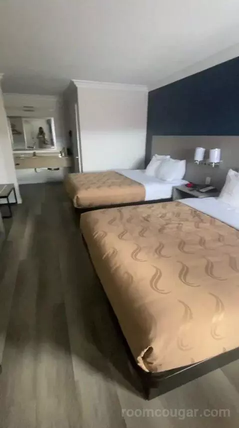 Queen Room with Two Queen Beds (#106) bed picture #6