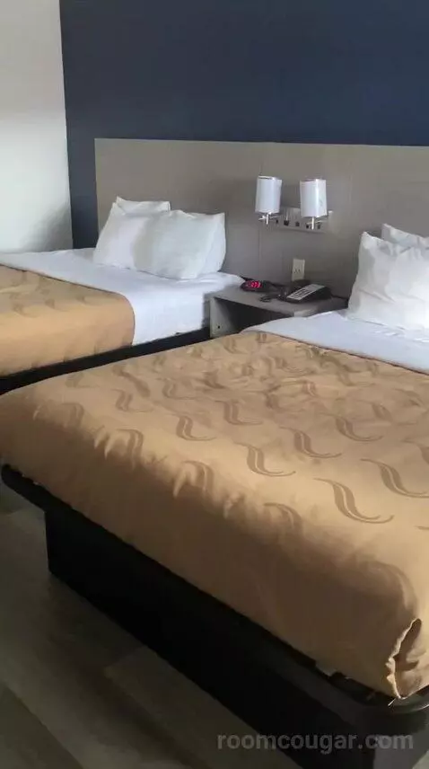 Queen Room with Two Queen Beds (#106) bed picture #7