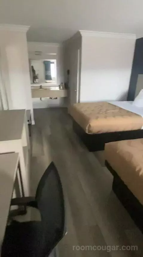 Queen Room with Two Queen Beds (#106) bed picture #10