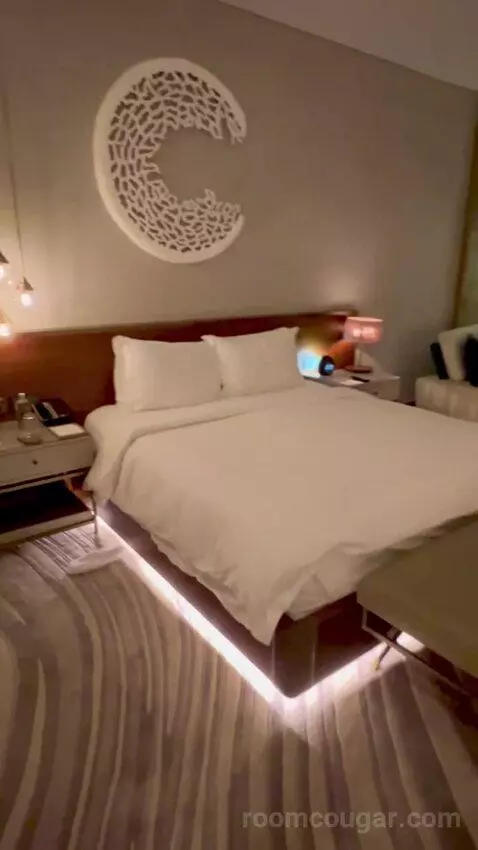 Superior King Suite with Downtown View Including Signature St. Regis Butler Service (#804) bed picture #7