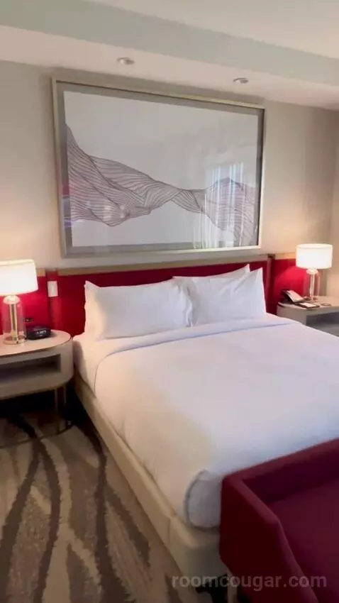 One-Bedroom King Suite with Strip View - Hearing Access (#18208) bed picture #1