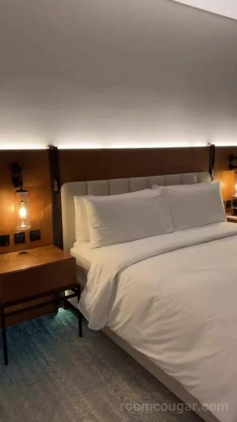King Deluxe Room with Sofa Bed and Waterfront View (#1102) bed picture #1
