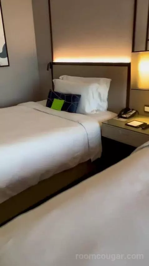 Newly Renovated - Sea View Room with Balcony - Twin Bed (#2303) bed picture #4