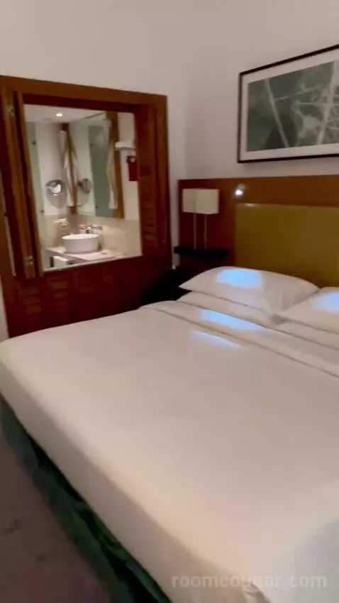 Superior King with Balcony (#608) bed picture #8