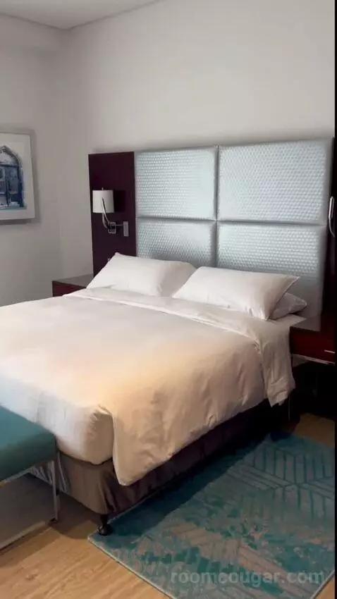 Junior King Suite with Sea View (#0302) bed picture #4