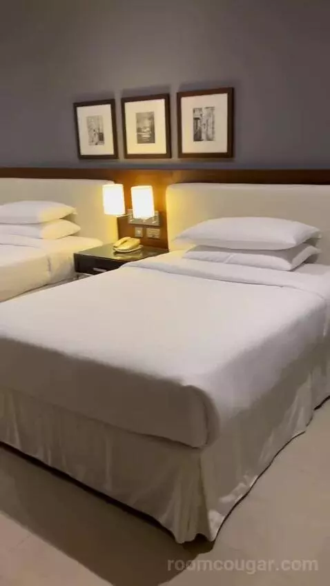 Classic Twin Room with Balcony - Complimentary Shuttle Service To Dubai Mall and Kite Beach (#0205) bed picture #2