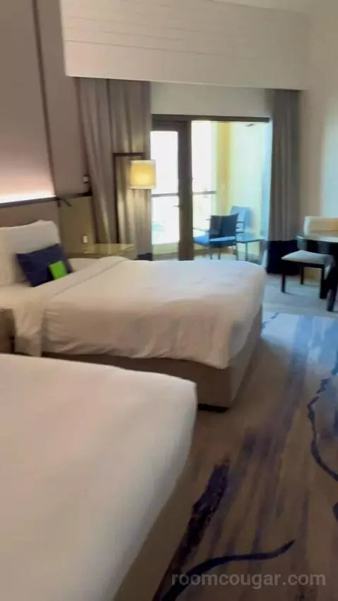 Newly Renovated - Sea Front View Room with Balcony - Twin Bed (#1702) bed picture #1