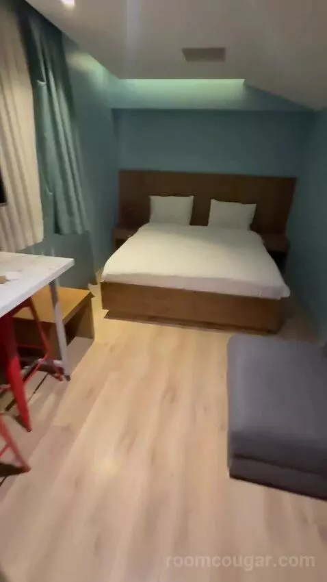 Deluxe Room with Kitchenette (#213) bed picture #7