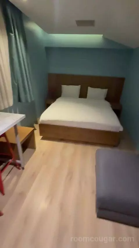 Deluxe Room with Kitchenette (#213) bed picture #8