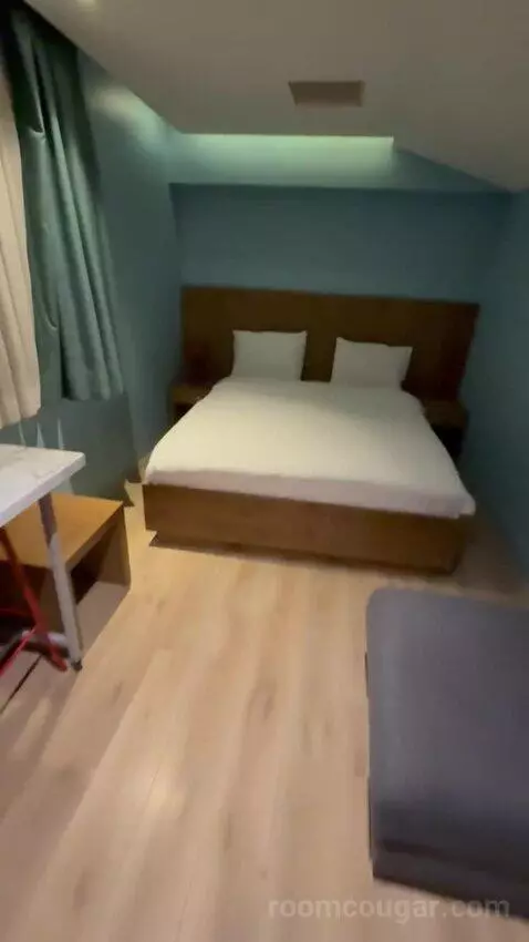 Deluxe Room with Kitchenette (#213) bed picture #9
